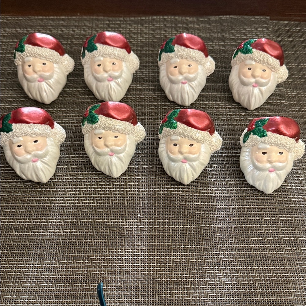 Vintage Rare 8 piece ceramic Santa Claus napkin rings for Christmas.